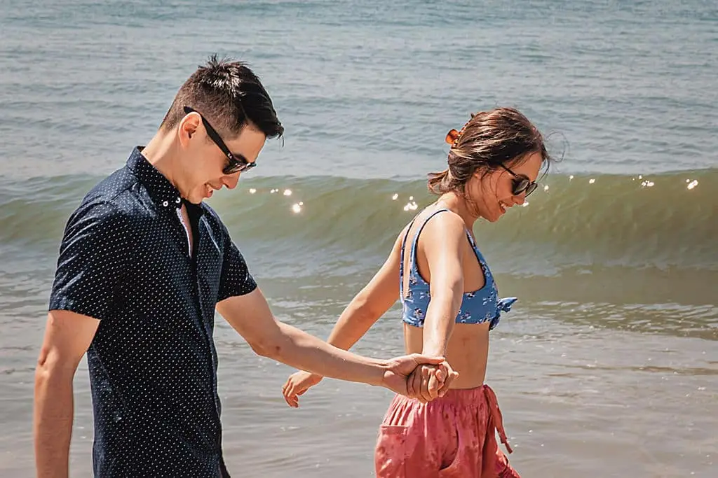 Couple walking on the beach