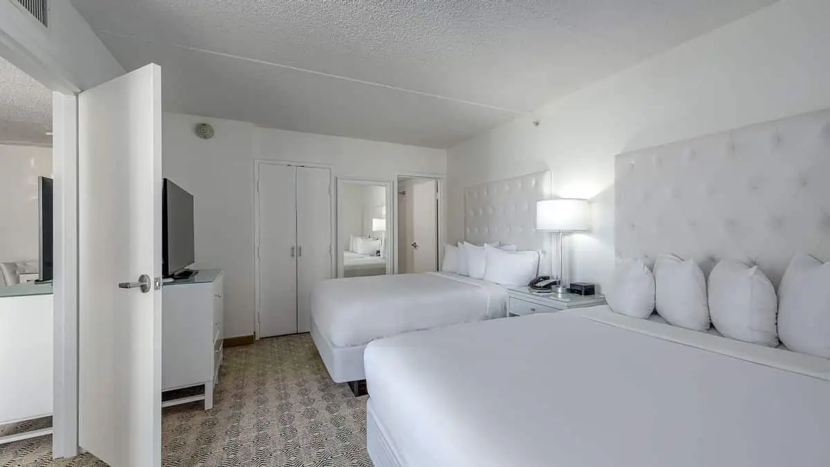 Premium double suite hotel room beds