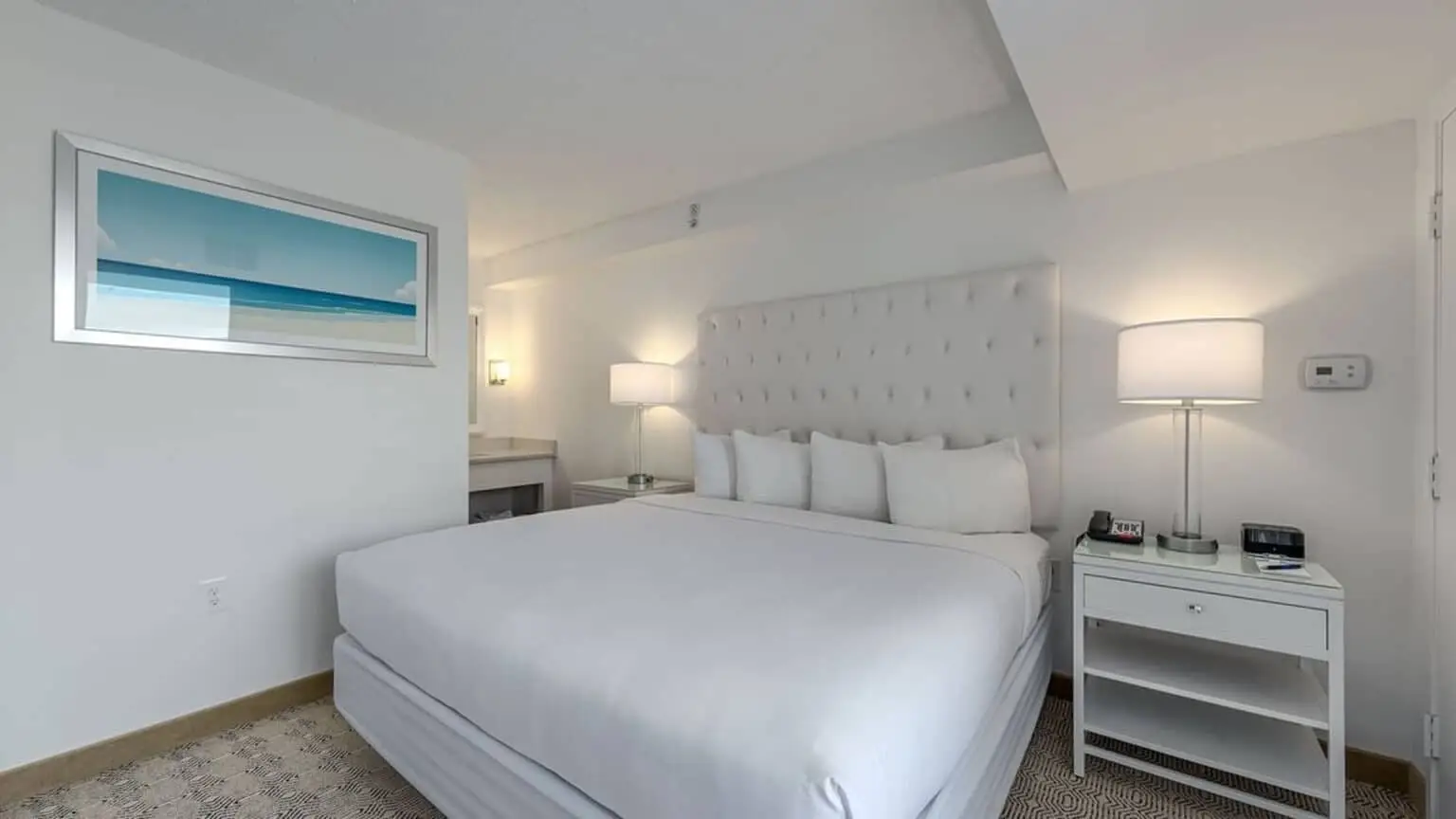 Premium king suite bed at ICONA Diamond Beach