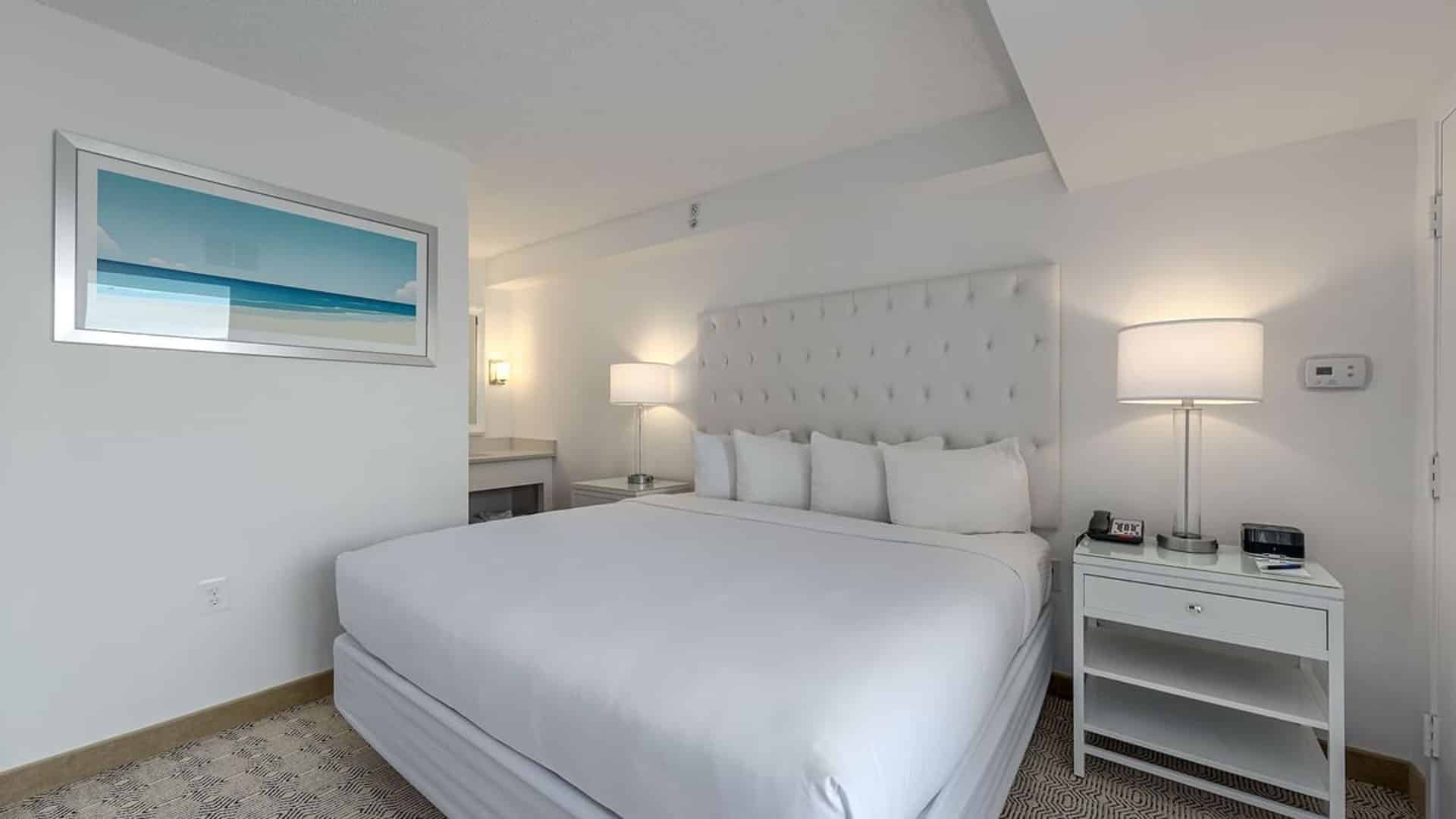 Signature king suite hotel room bedroom at ICONA Diamond Beach