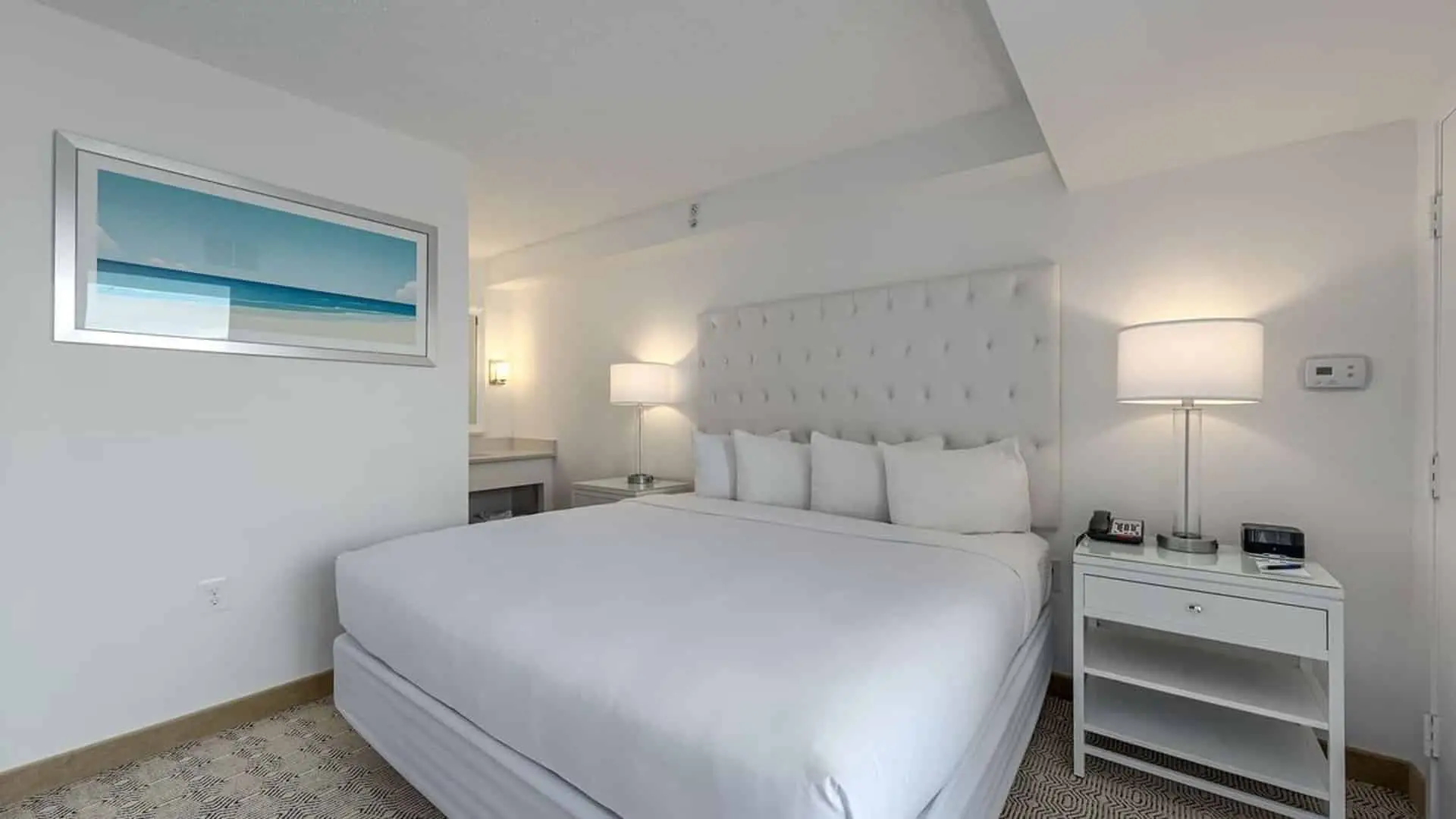 Premium king suite bed at ICONA Diamond Beach
