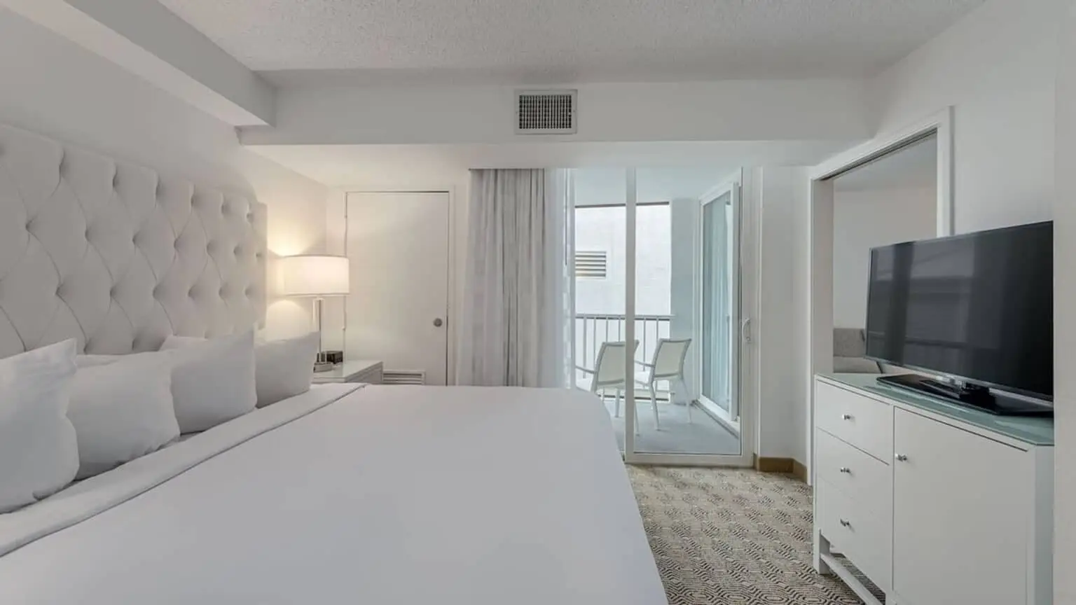 Premium king suite bedroom at ICONA Diamond Beach