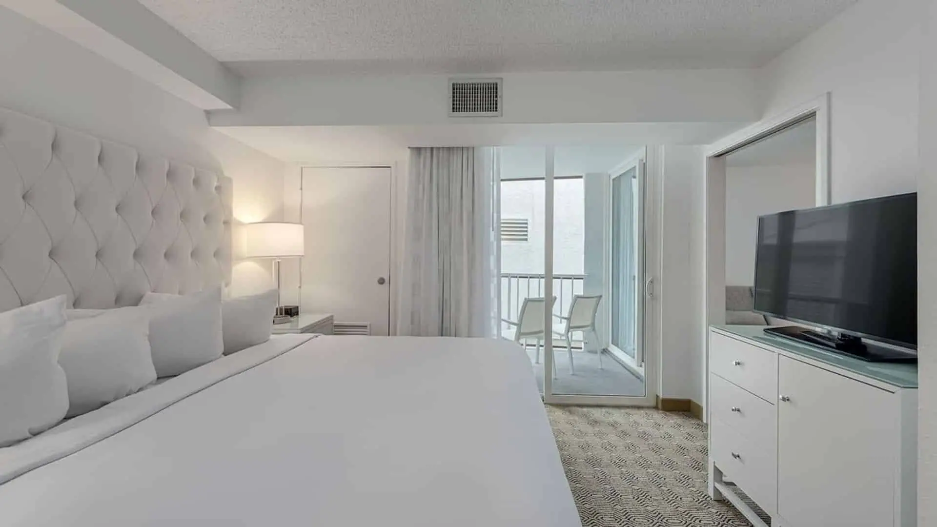 Premium king suite bedroom at ICONA Diamond Beach