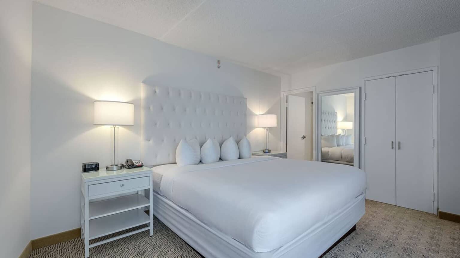 Premium king suite bed at ICONA Diamond Beach