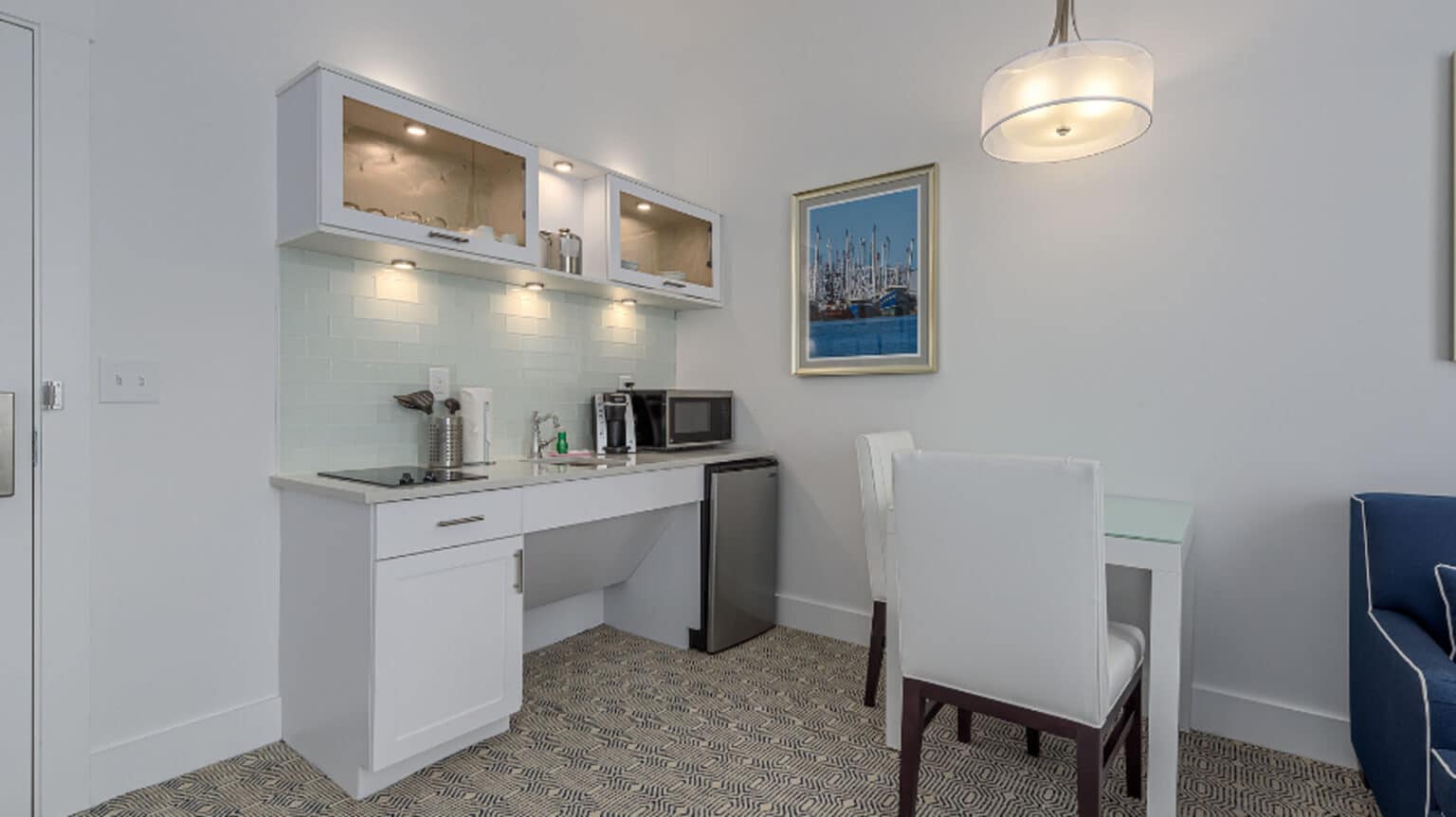 ICONA Diamond Beach ADA King Suite kitchenette and seating area