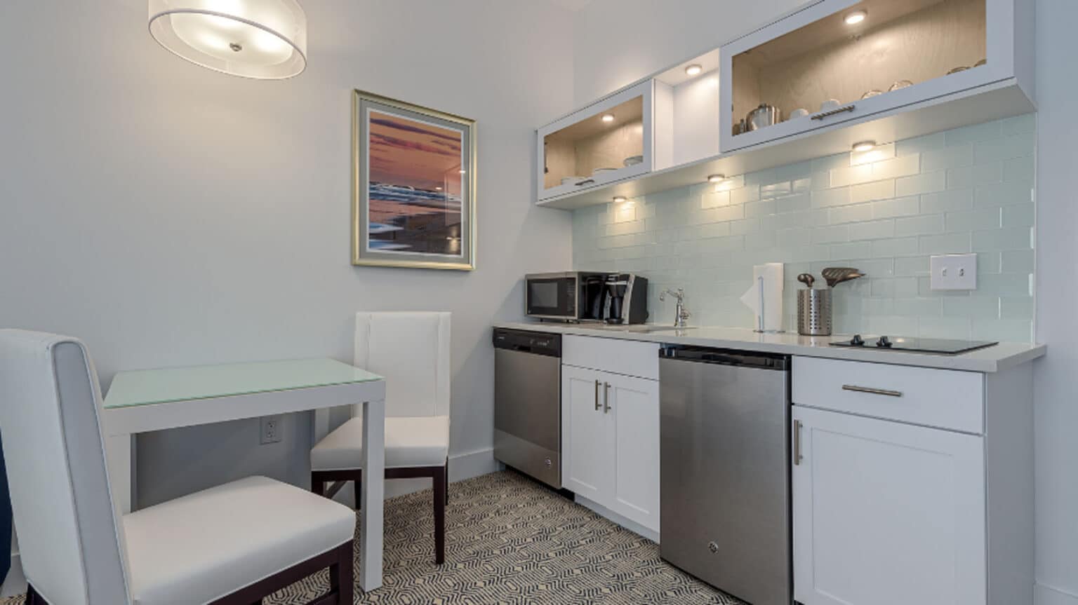 ICONA Diamond Beach top floor king suite hotel room kitchenette and seating area