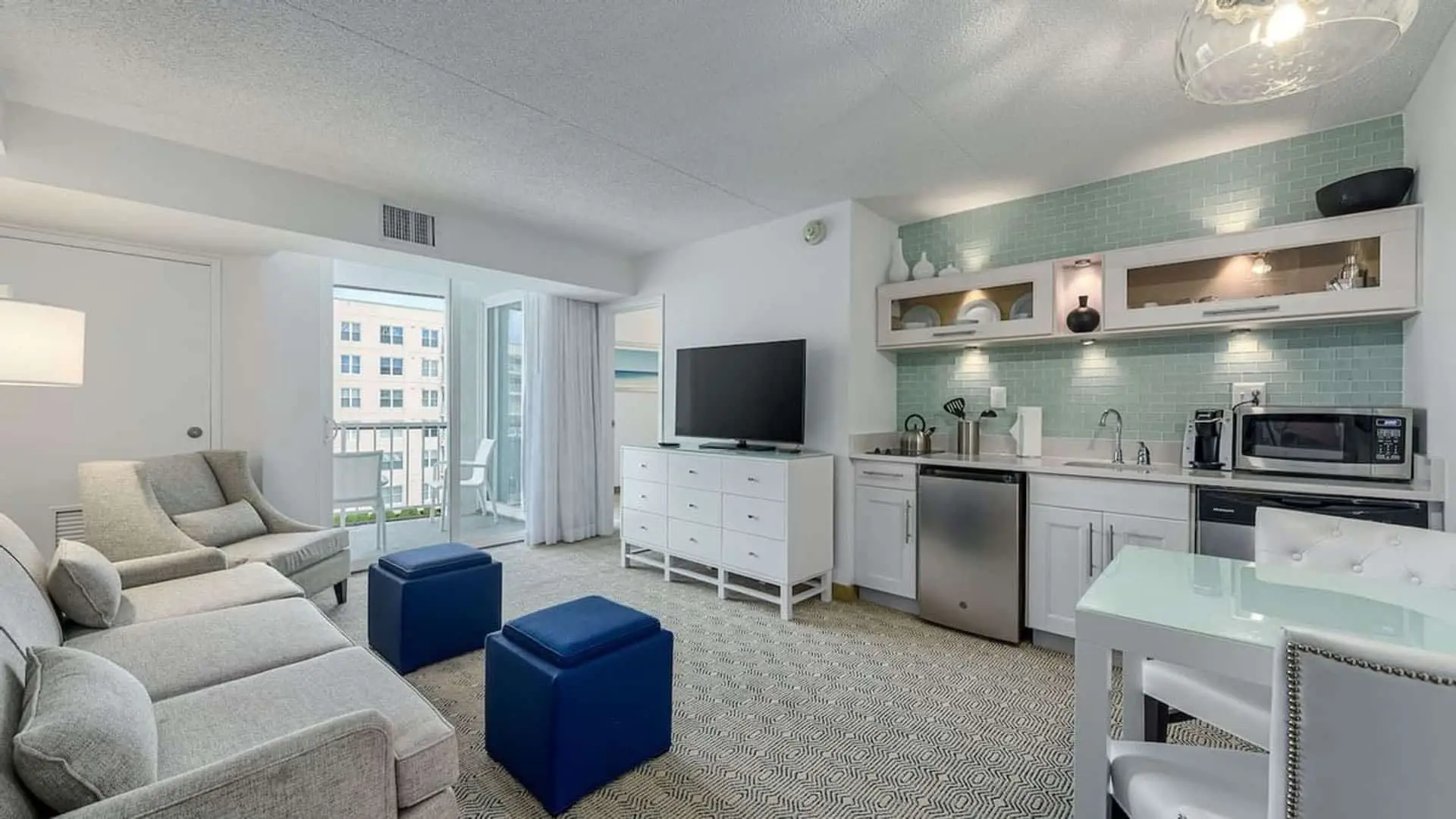 Premium poolside double suite living room and kitchen