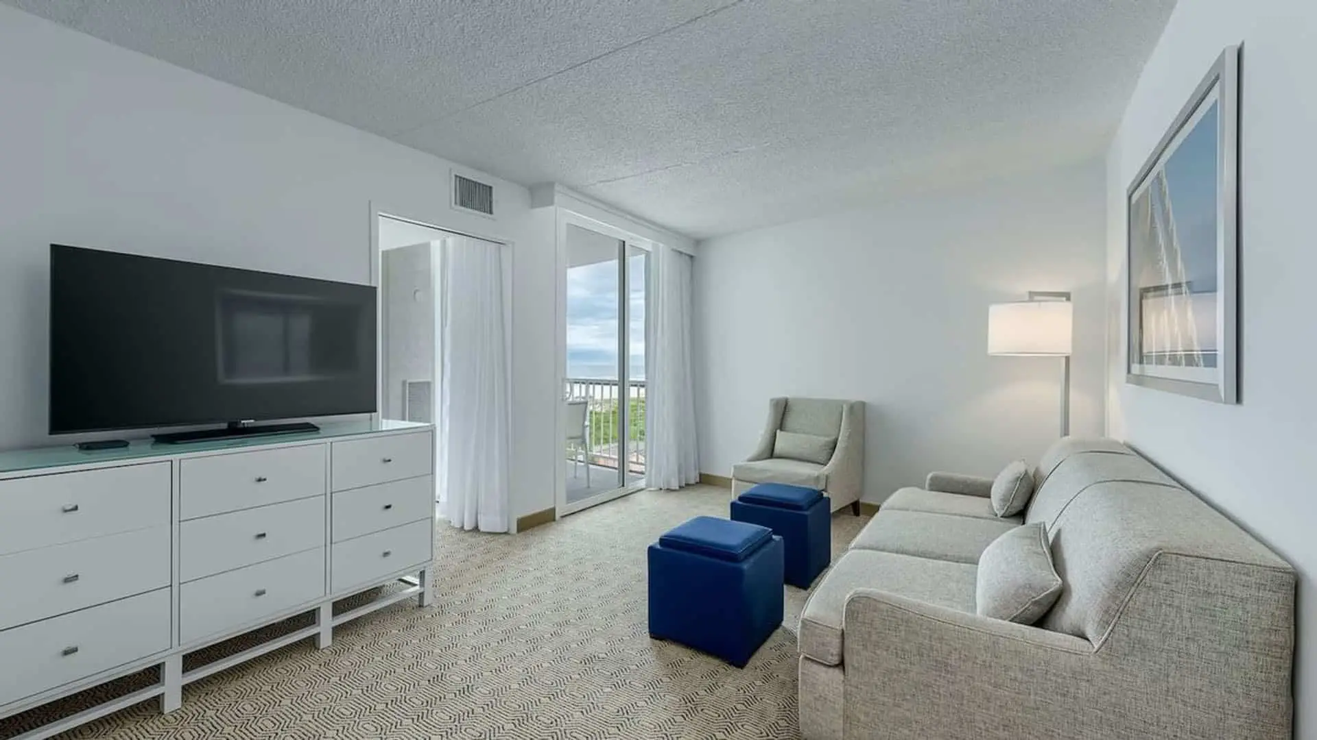 Premium poolside double suite hotel room living room