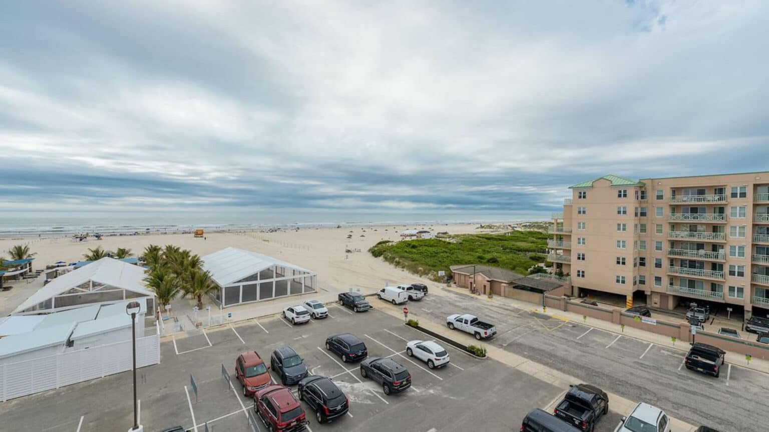 Premium poolside king suite hotel room view from balcony
