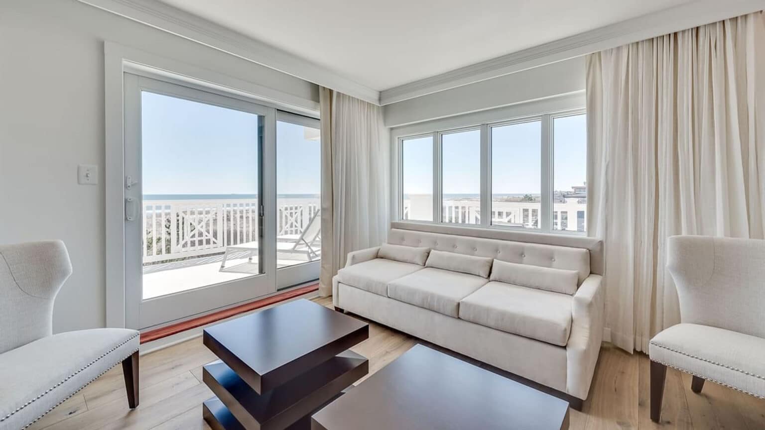 Living area and windows on corner Oceanfront luxury king studio