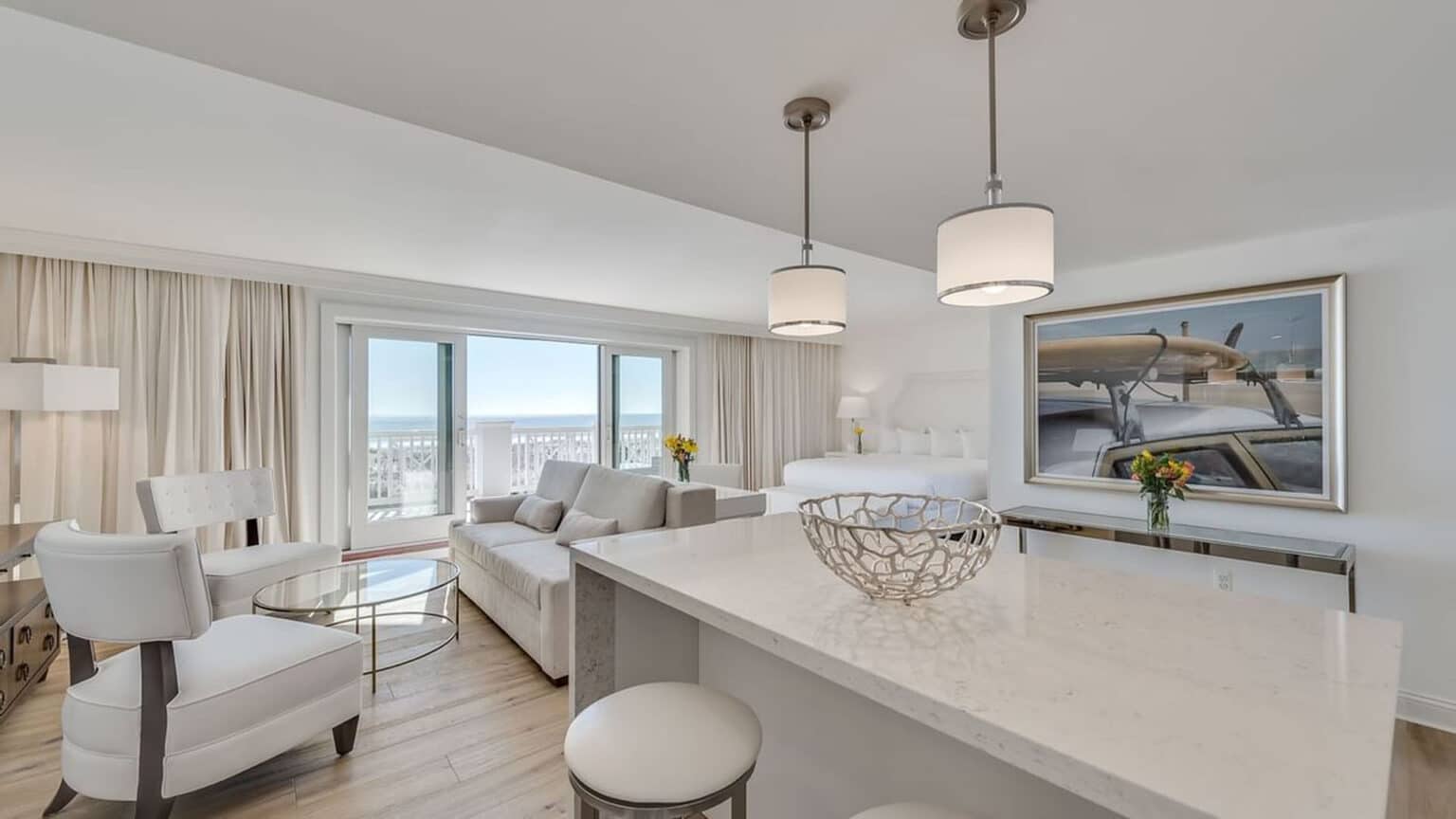 Looking out at the balcony from the kitchen in the Oceanfront luxury king studio
