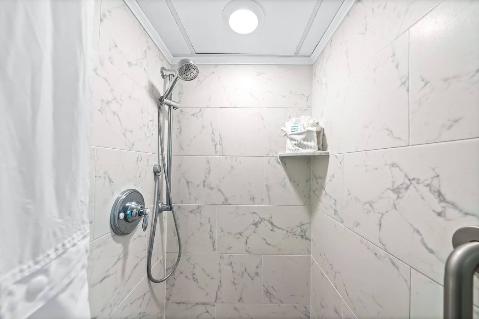 Classic queen studio ADA hotel room roll in shower