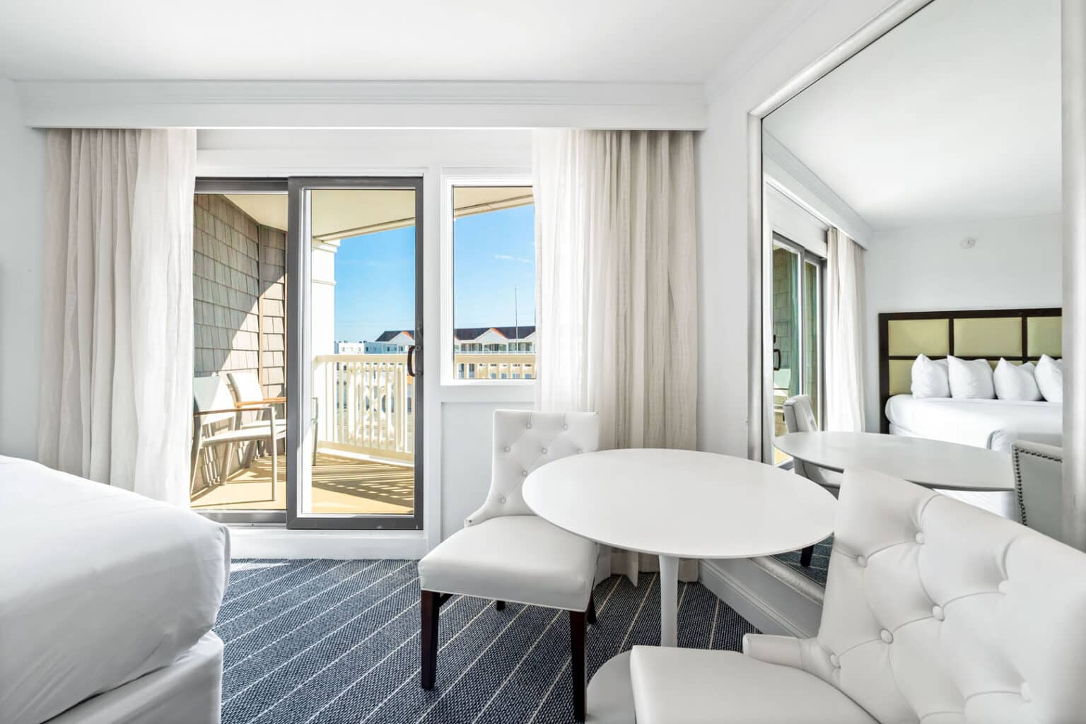 Classic queen studio ADA hotel room seating area