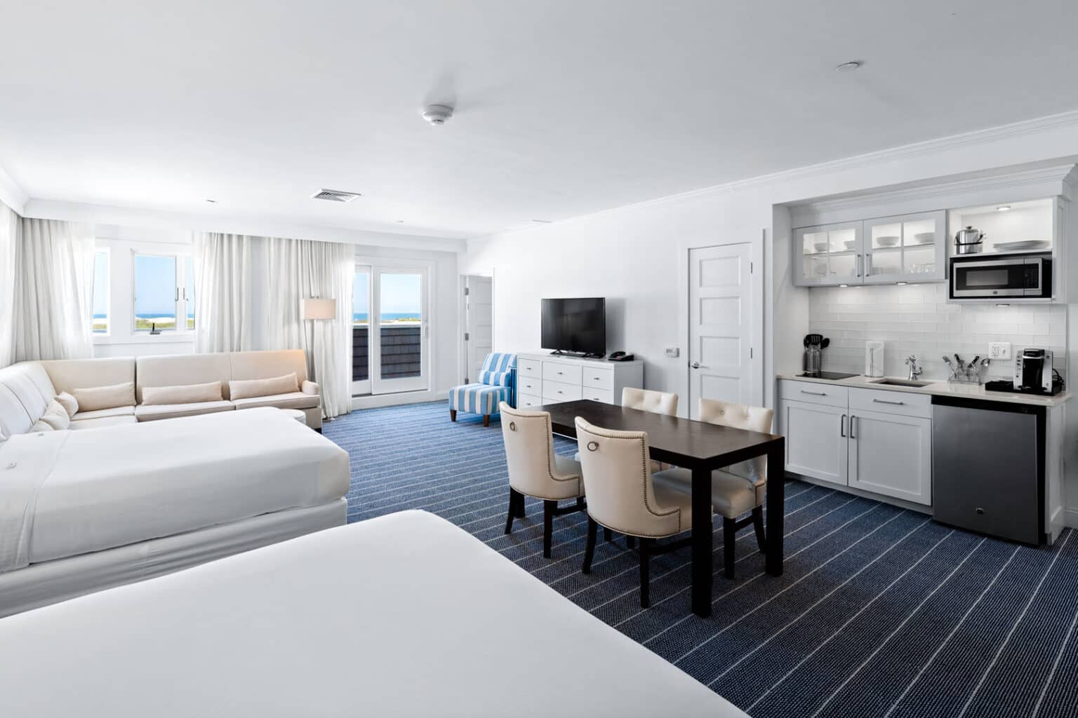 Premium family suite sleeping and living area