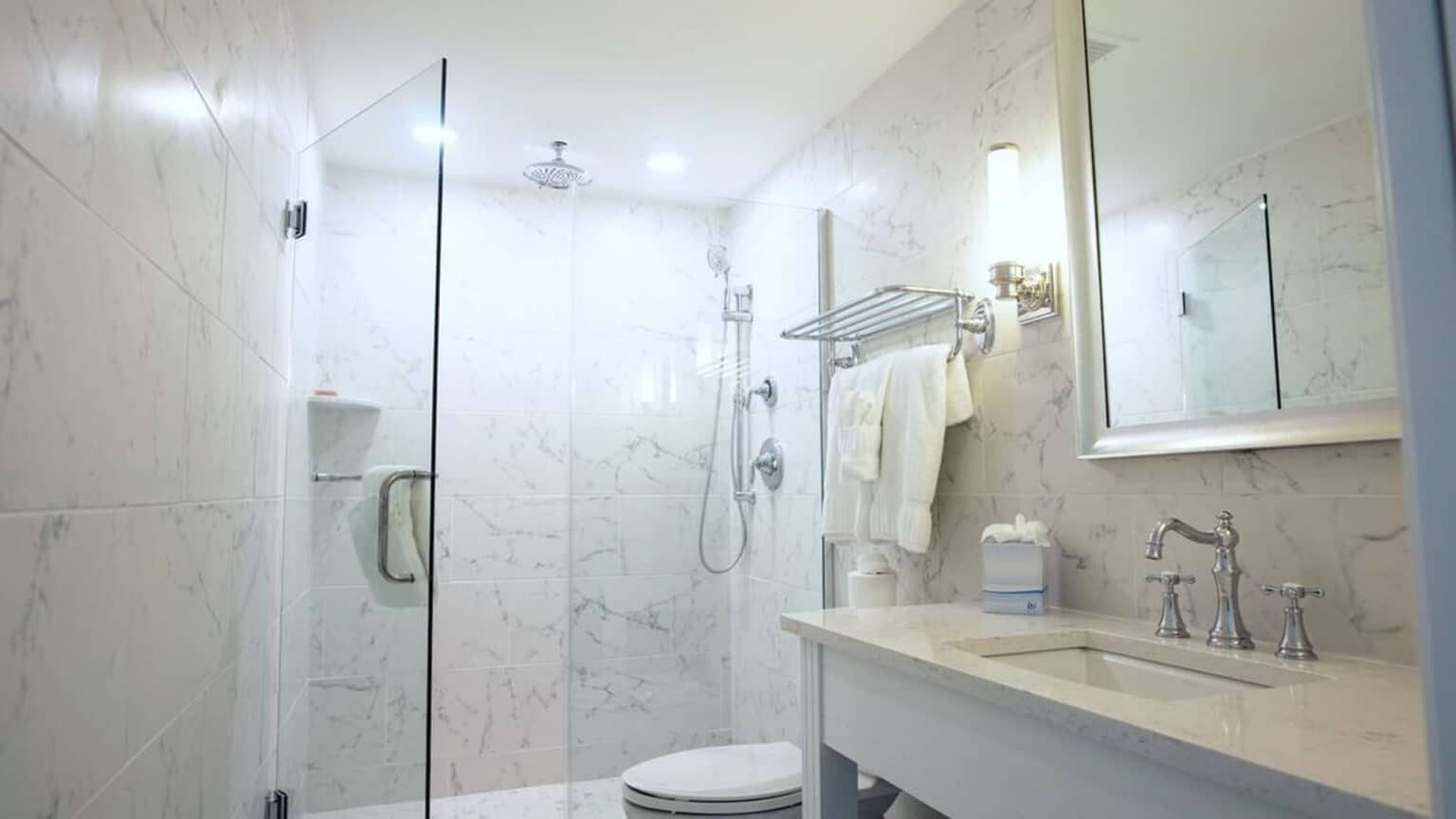 Premium queen studio hotel room bathroom shower