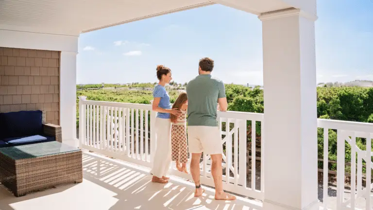 Family on a balcony at ICONA Avalon
