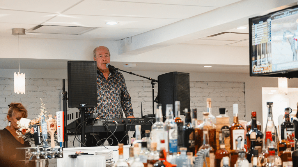 Musician performing at the Piano Bar at ICONA Windrift