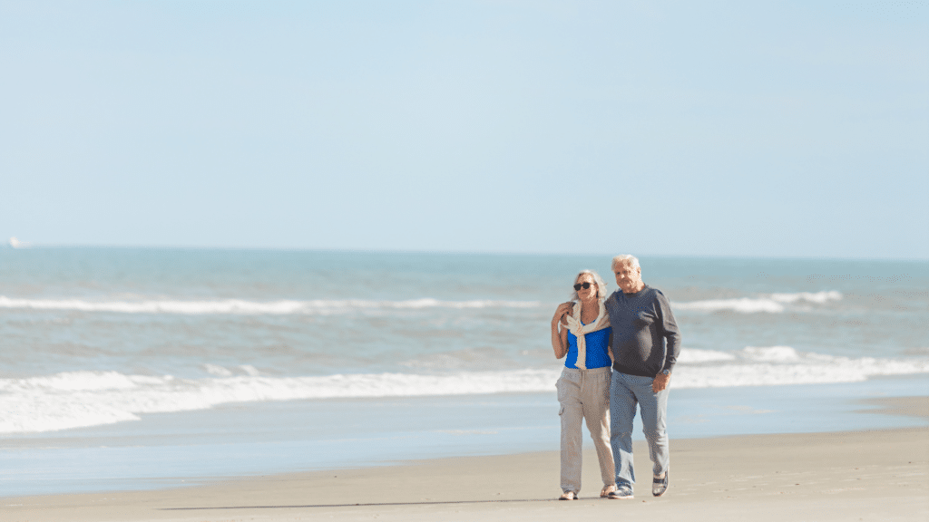 Couple taking a calming walk on the beach
